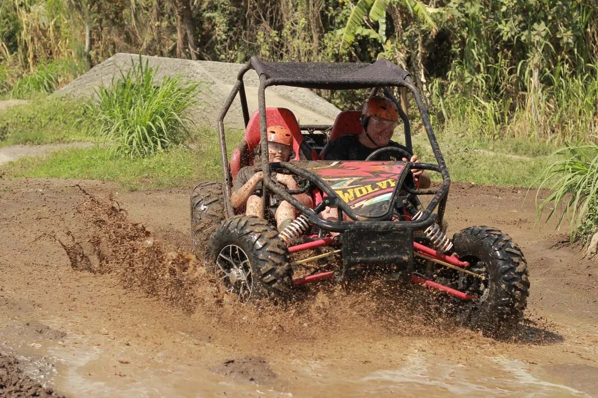 Riders enjoying muddy action in Bali