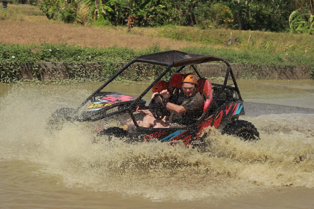 Buggy splashing through water